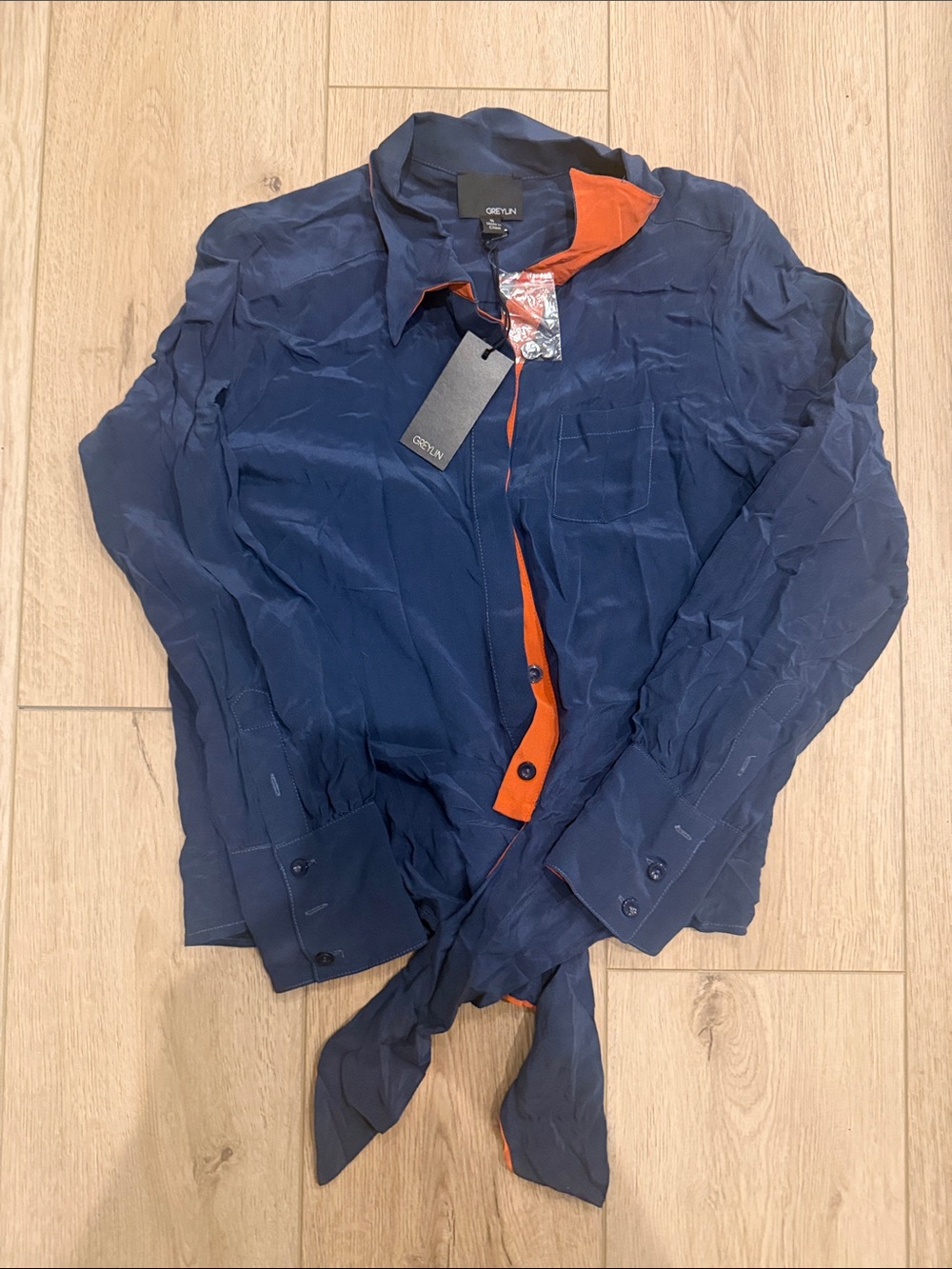 Greylin Navy blouse with Orange Trim as seen on Kourtney K